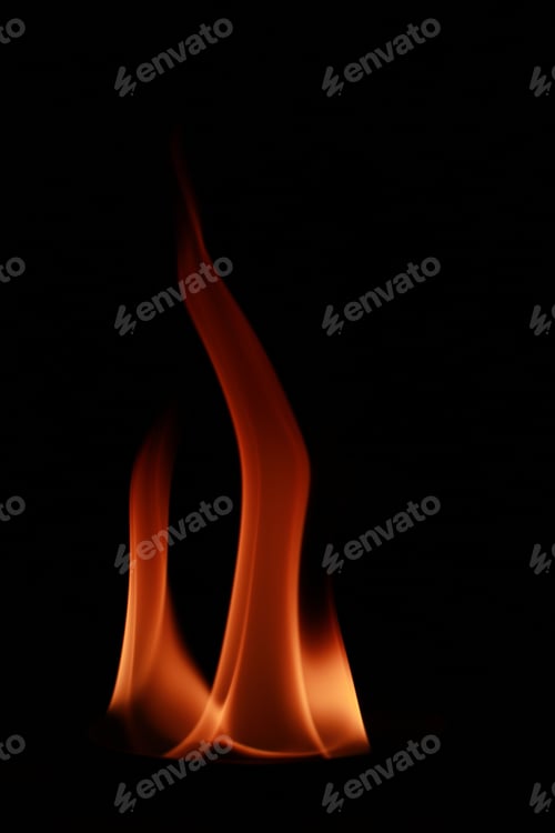Preview: Vertical shot of flames isolated on a black background for textures