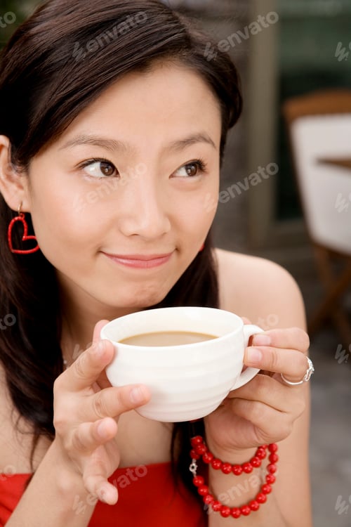 Preview: Chinese Young Woman Drinking Cup Of Tea