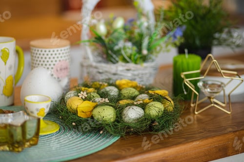 Preview: Easter eggs on wreath. Easter table decorations