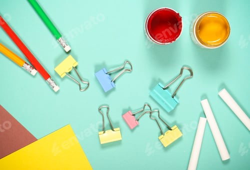 Preview: Goods For Creativity And School Lie On A Bright Background Near School Black Board