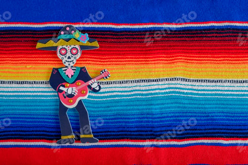 Preview: Catrin figure on colorful serape. Day of the Dead Celebration.
