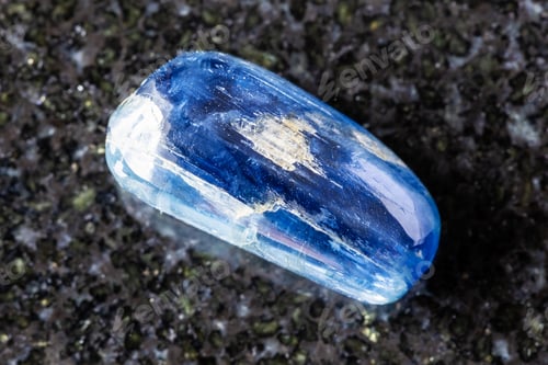 Preview: sample of tumbled blue kyanite gemstone on black