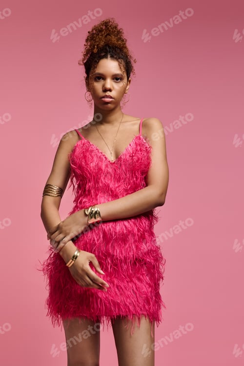Preview: Vibrant young woman in stylish pink outfit exuding confidence and beauty against a pink backdrop