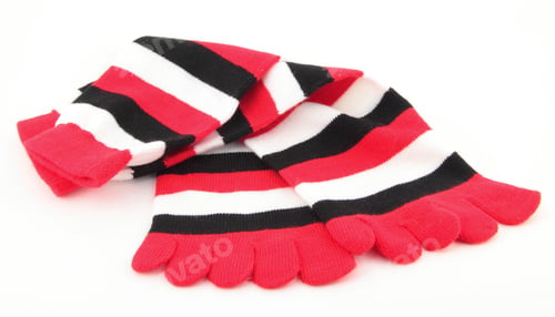 Preview: Multicolor child's striped socks isolated