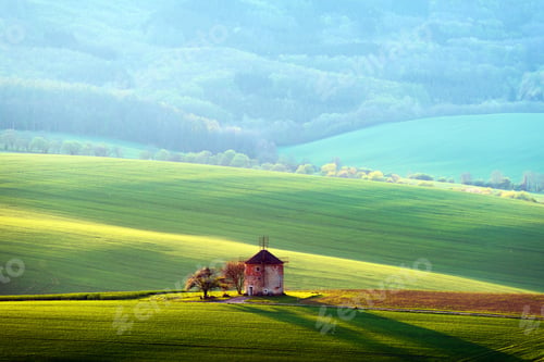 Preview: Picturesque rural landscape with old windmill