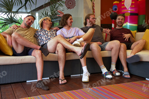 Preview: Group of handsome young men sitting on a porch