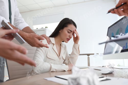 Preview: Businesswoman stressing out at workplace in office