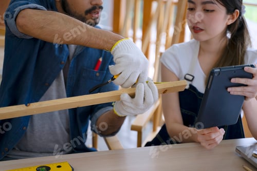 Preview: Carpenters are working at woodshop.