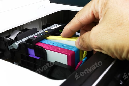 Preview: Technicians are install setup the ink cartridge of a inkjet printer