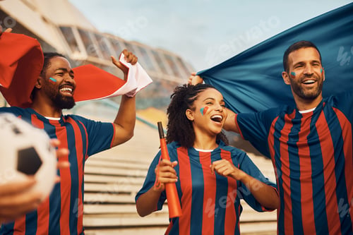 Preview: Cheerful soccer fans celebrating winning goal of their favorite team during world championship.