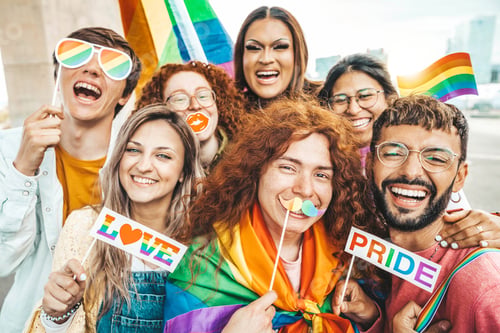 Preview: Diverse group of young people celebrating gay pride festival day