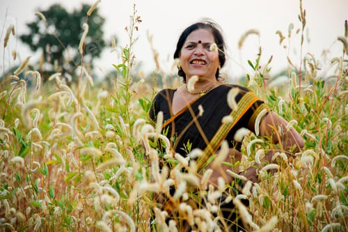 Preview: Smiling woman farmer in agricultural field