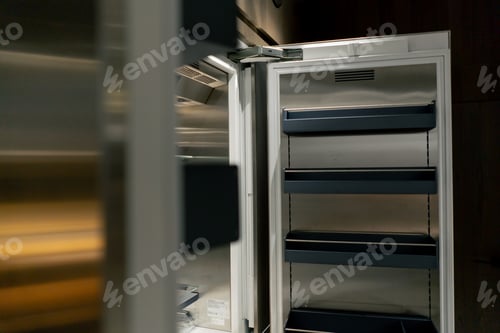 Preview: close-up of a professional kitchen with metal doors of an empty refrigerator for food storage