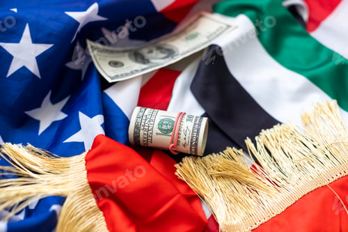 Preview: Stack of money on American Flag. dollars
