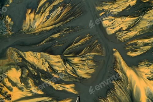 Preview: Flying over surreal patterns of flowing colorful mining chemical residuals aerial