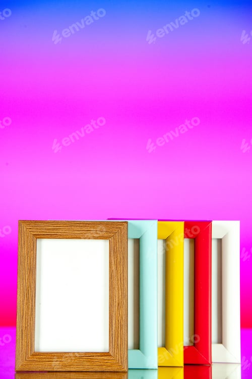 Preview: front view different picture frames with colored corners on light pink floor family memory portrait