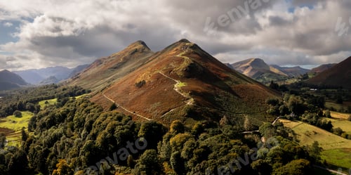 Preview: Aerial view of Catbells mountain in The Lake District National Park in Autumn sunlight