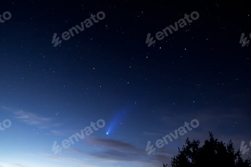Preview: Comet Neowise in the night sky. Astrophotography - meteor on starry background