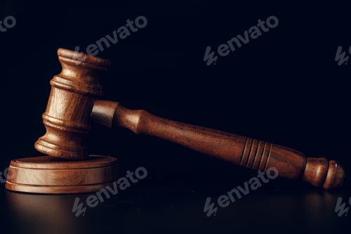 Preview: Judge gavel close up on paper background. Law and justice, legality concept
