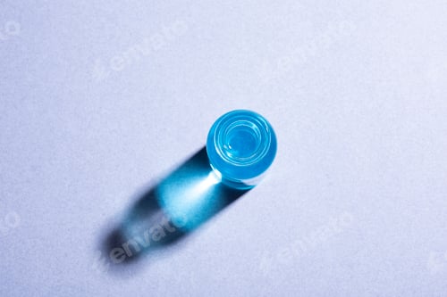 Preview: Blue medical ampoule on white background