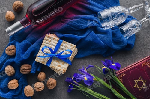 Preview: top view of matza, torah and wine on table, jewish Passover holiday concept