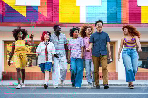 Preview: Friends Strolling Along City Street With Colorful Building