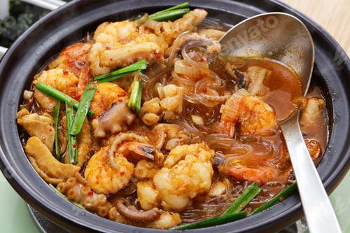 Preview: Nak-Gop-Sae is a spicy soup with octopus, beef small intestine, and shrimp. Korean cuisine