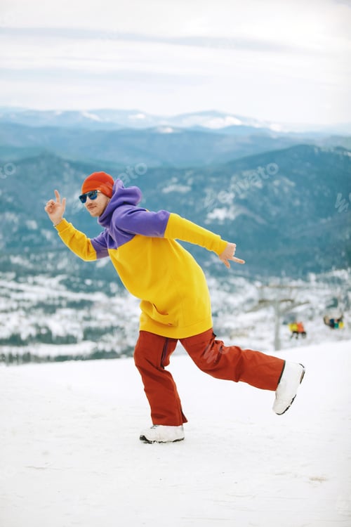 Preview: Man in ski clothes on a slope