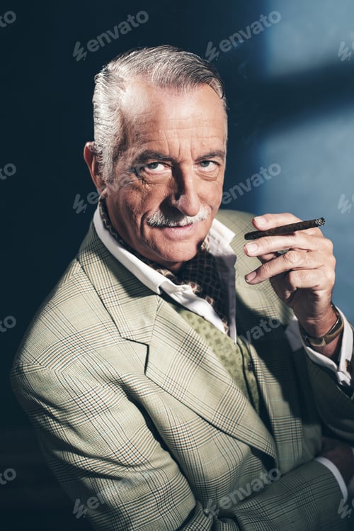 Preview: Cigar Smoking Retro 1940 Senior Businessman. Studio Shot.