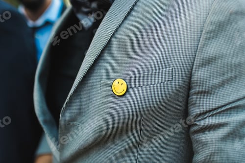 Preview: A sheet with a smile on a man's jacket, a positive attitude to life's problems.