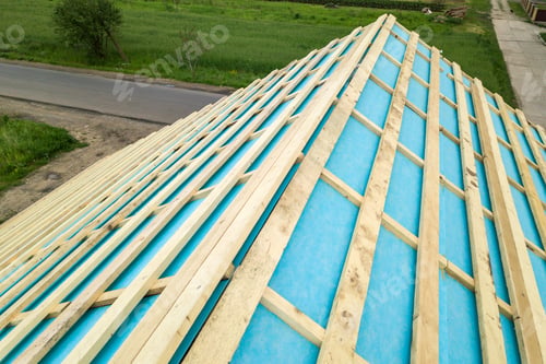 Preview: Brick house with wooden roof frame under construction