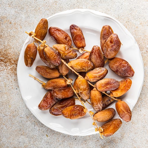 Preview: date on a branch dried sweet fruit fresh meal food snack on the table copy space food background