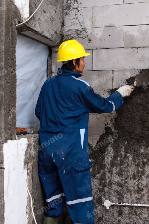 Preview: Labor Applying Cement on Wall