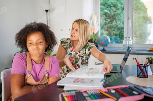 Preview: Parent and child having homework conflict at kitchen table