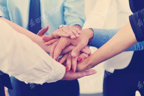 Preview: business people group joining hands