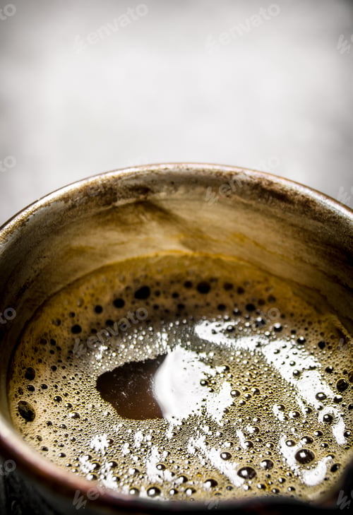 Preview: Hot coffee prepared in a pot.