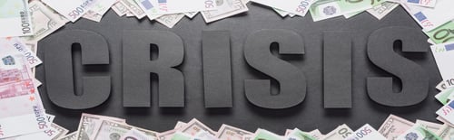 Preview: top view of word crisis in frame of dollar and euro banknotes on black background with shadows,
