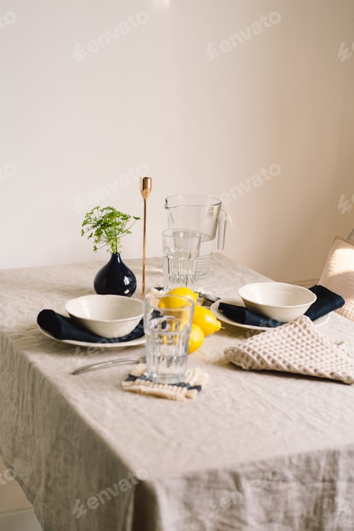 Preview: Vintage table setting with Linen napkins and yellow lemons.