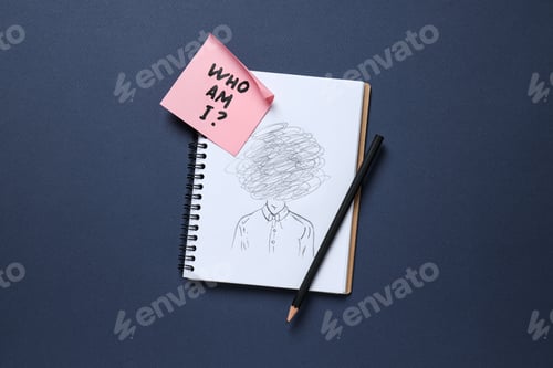 Preview: Notepad with pencil drawing and pink note with text on dark blue background
