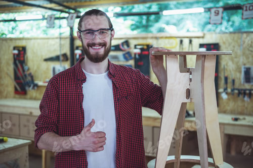 Preview: Handsome carpenter working