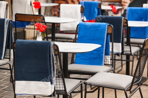 Preview: Street coffee shop outdoor furniture with blankets in autumn time