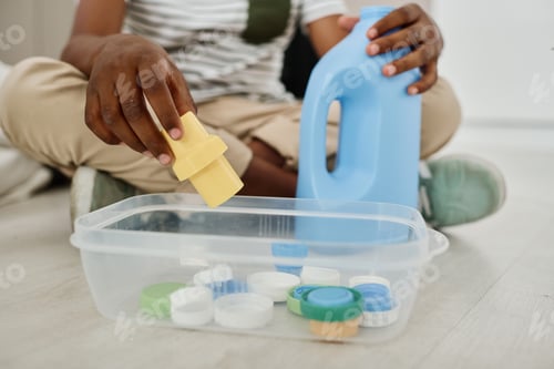 Preview: Boy sorting rubbish in containers
