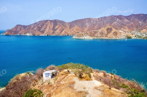 Preview: Beautiful blue water surrounded by mountains in Colombia.