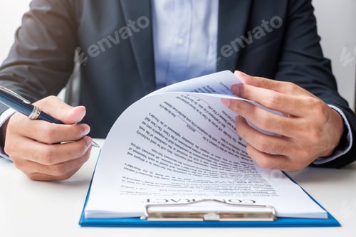 Preview: Businessman signing on contract documents after reading, man holding pen and approve