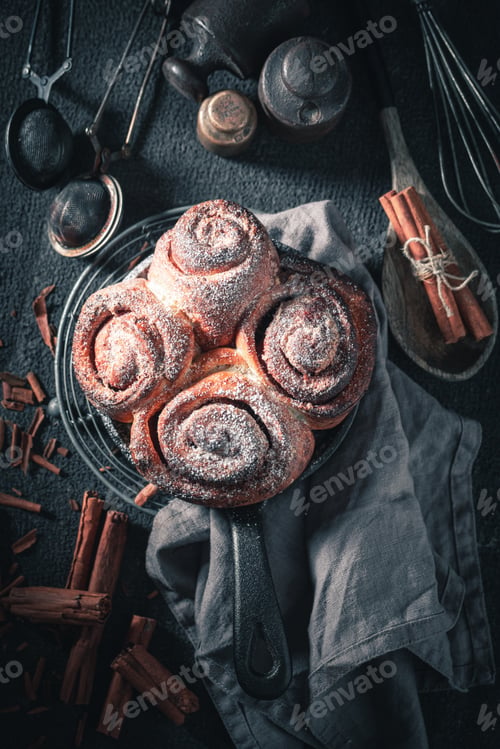 Preview: Delicious cinnamon rolls with cocoa and sugar. Best Christmas snack.