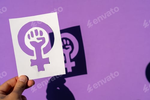 Preview: Empowering Symbol of Feminism on a Purple Background