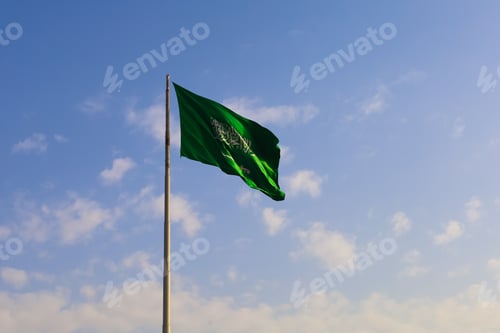 Preview: Saudi Arabia national flag waving in sky - Saudi National Day
