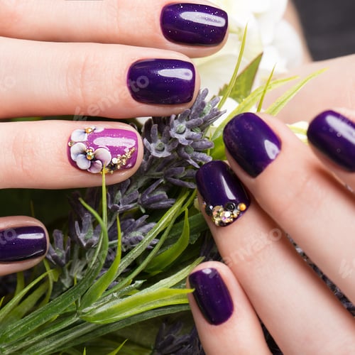 Preview: Shot beautiful manicure with flowers on female fingers. Nails design. Close-up