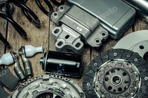 Preview: Car parts set on wooden background close up