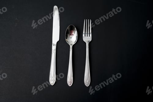 Preview: Horizontal shot of knife, spoon, and fork